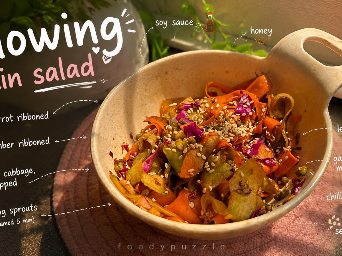 Glowing skin salad — ribboned carrot, cucumber, purple cabbage and moong sprouts in a soy-honey-lemon dressing